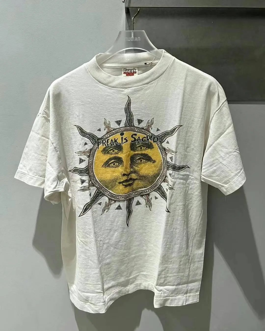 CACTUS PLANT FLEA MARKET x SAINT Mxxxxxx SUN SS TEE/WHT CPFM joint model Four-eye sun printed short sleeves Off-white S-XL Cylindrical fabric without side seams 220g high weight OE yarn ⚠️Note: It is almost meaningless if it is not a cylindrical fabric Customized CPFM joint main mark/wash mark/little angel anti-counterfeiting label Original-level printing factory Top purchasing level